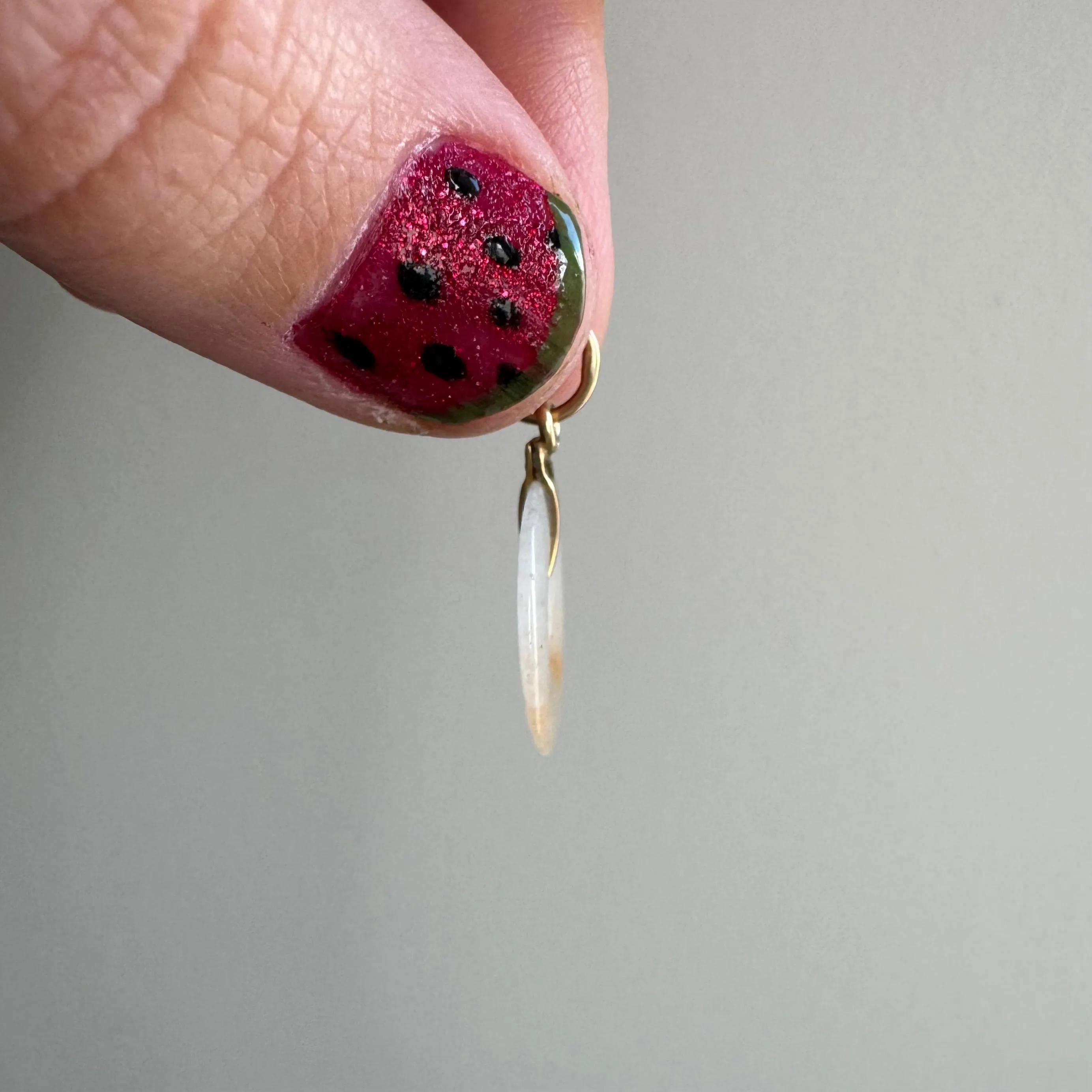 A N T I Q U E // the nature of energy / 14k white and orange jade donut / a dainty pendant