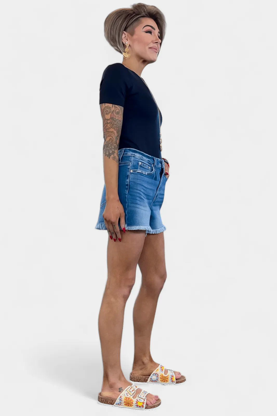 Medium Wash Mid Rise Raw Hem Denim Shorts