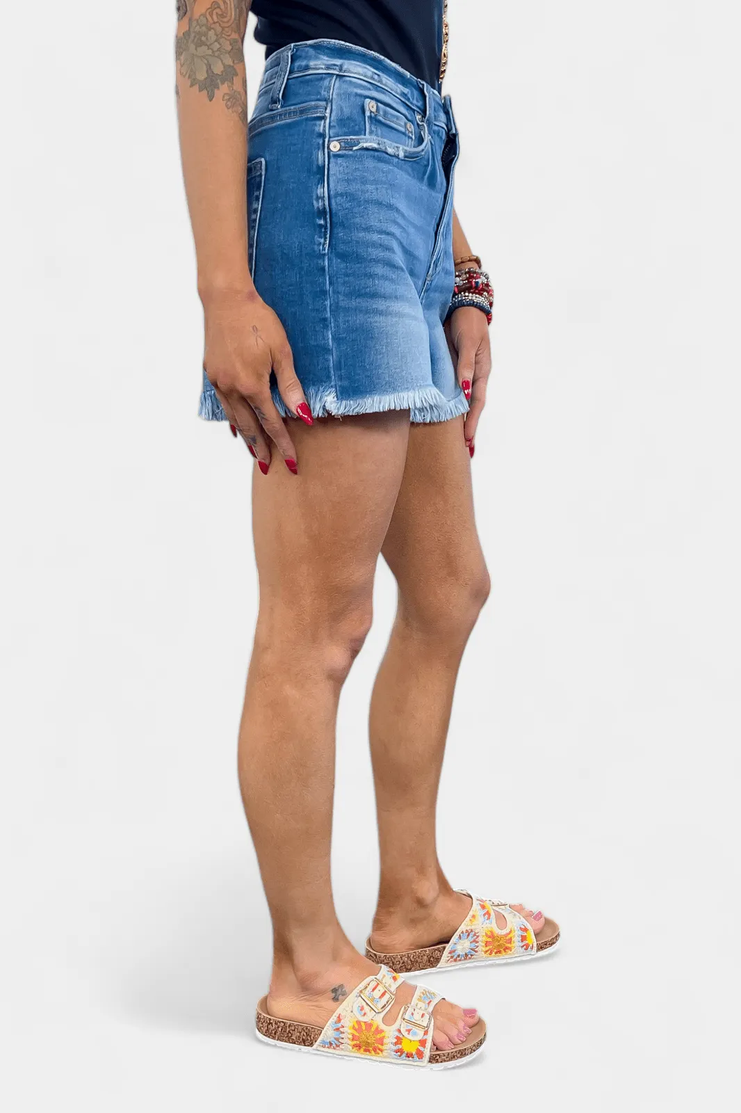 Medium Wash Mid Rise Raw Hem Denim Shorts