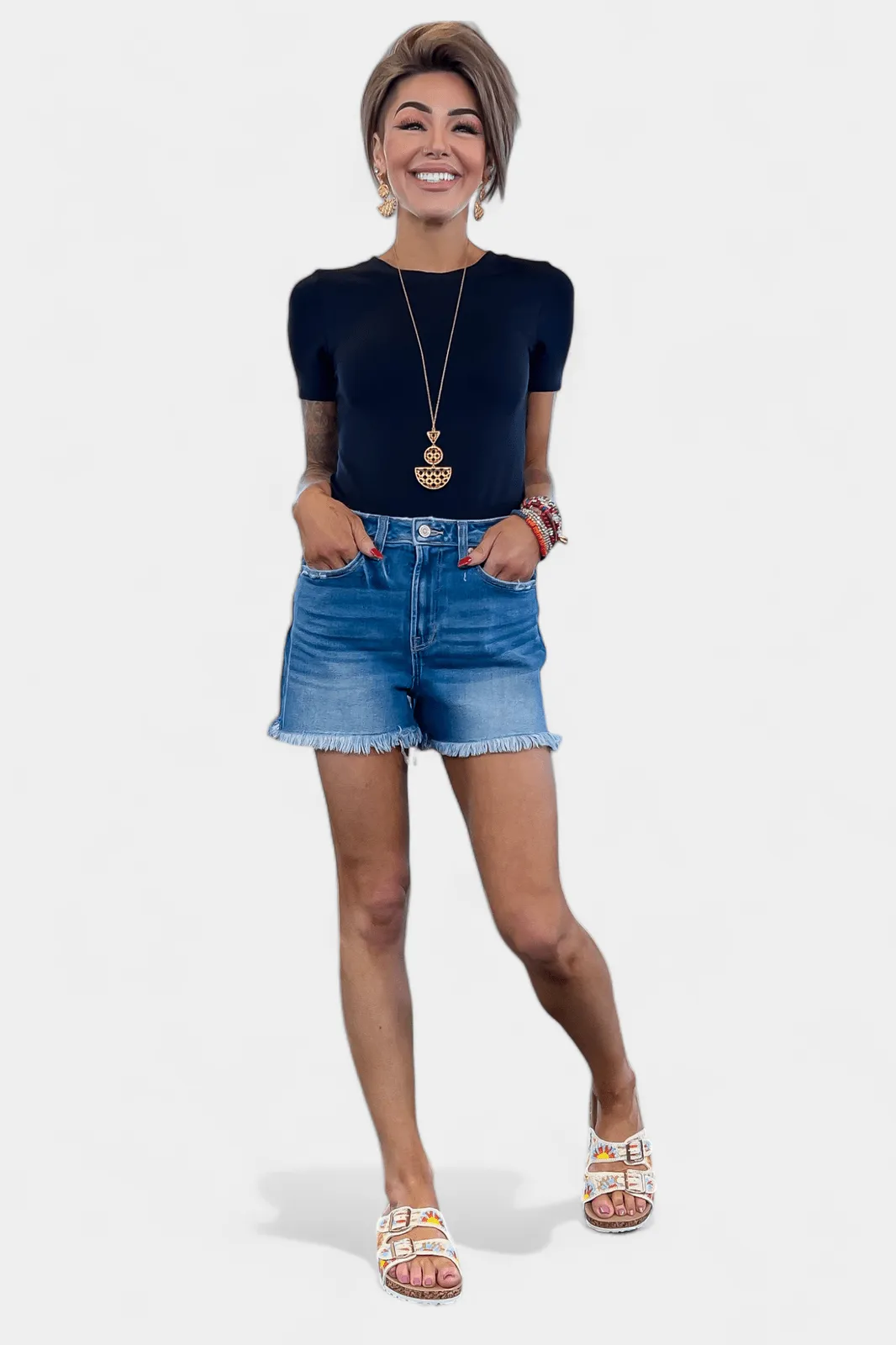 Medium Wash Mid Rise Raw Hem Denim Shorts